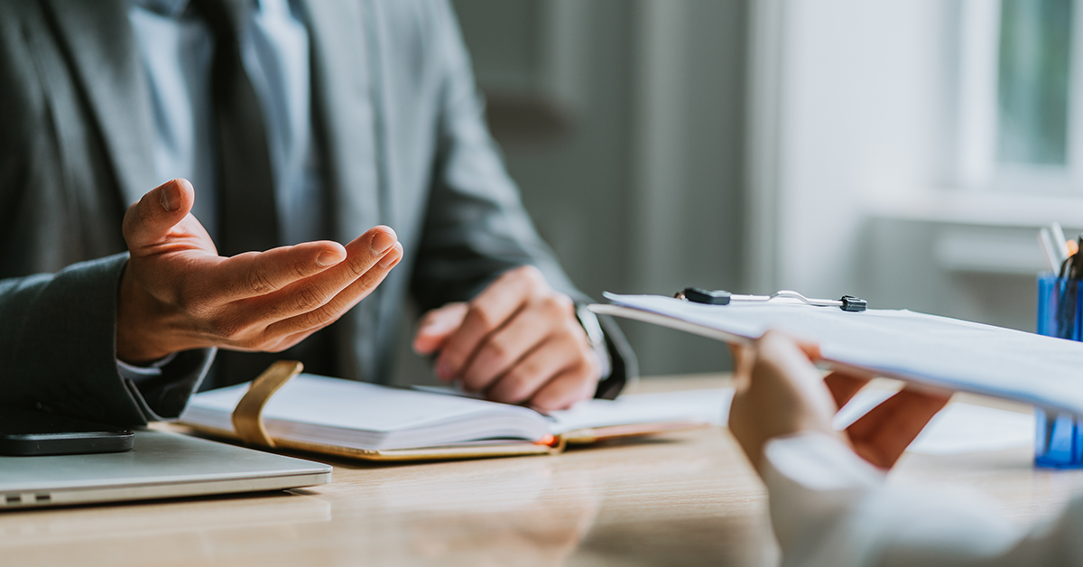 Male director is interviewing to recruit new employees 