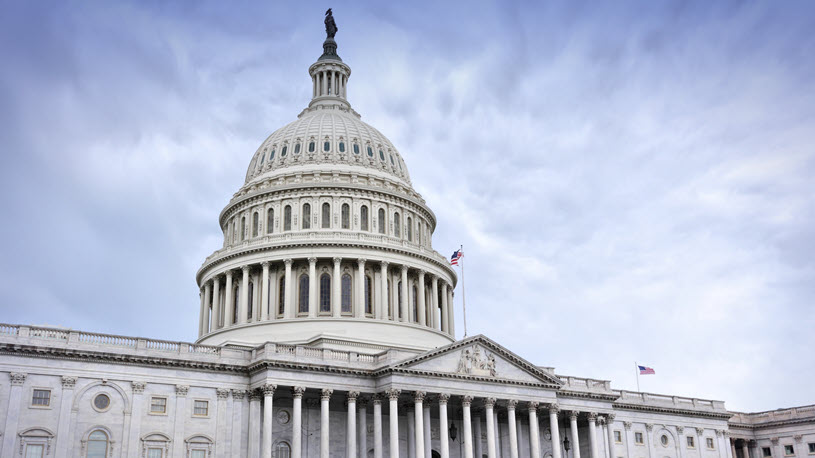 The Capitol building against a cloudy sky