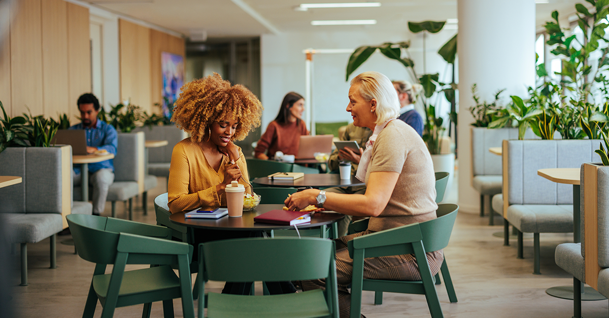 Coworkers enjoying lunch break at work
