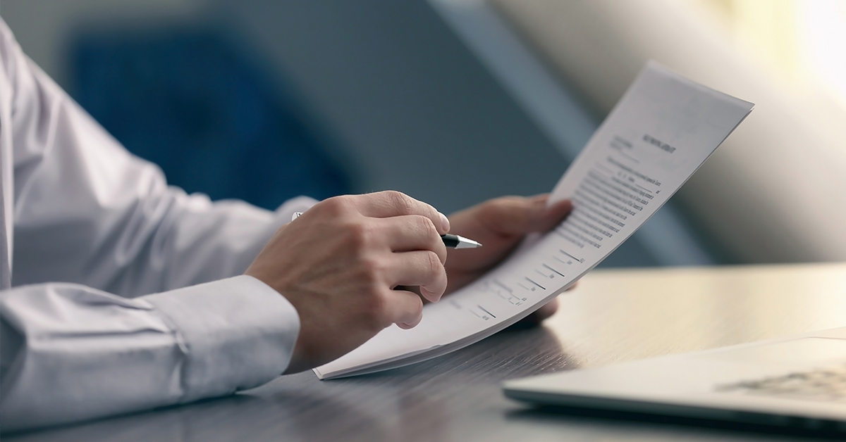 Businessman reading documents